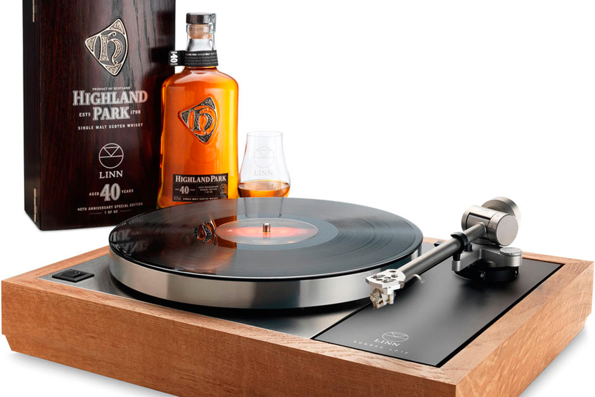 Record player and bottle of whisky