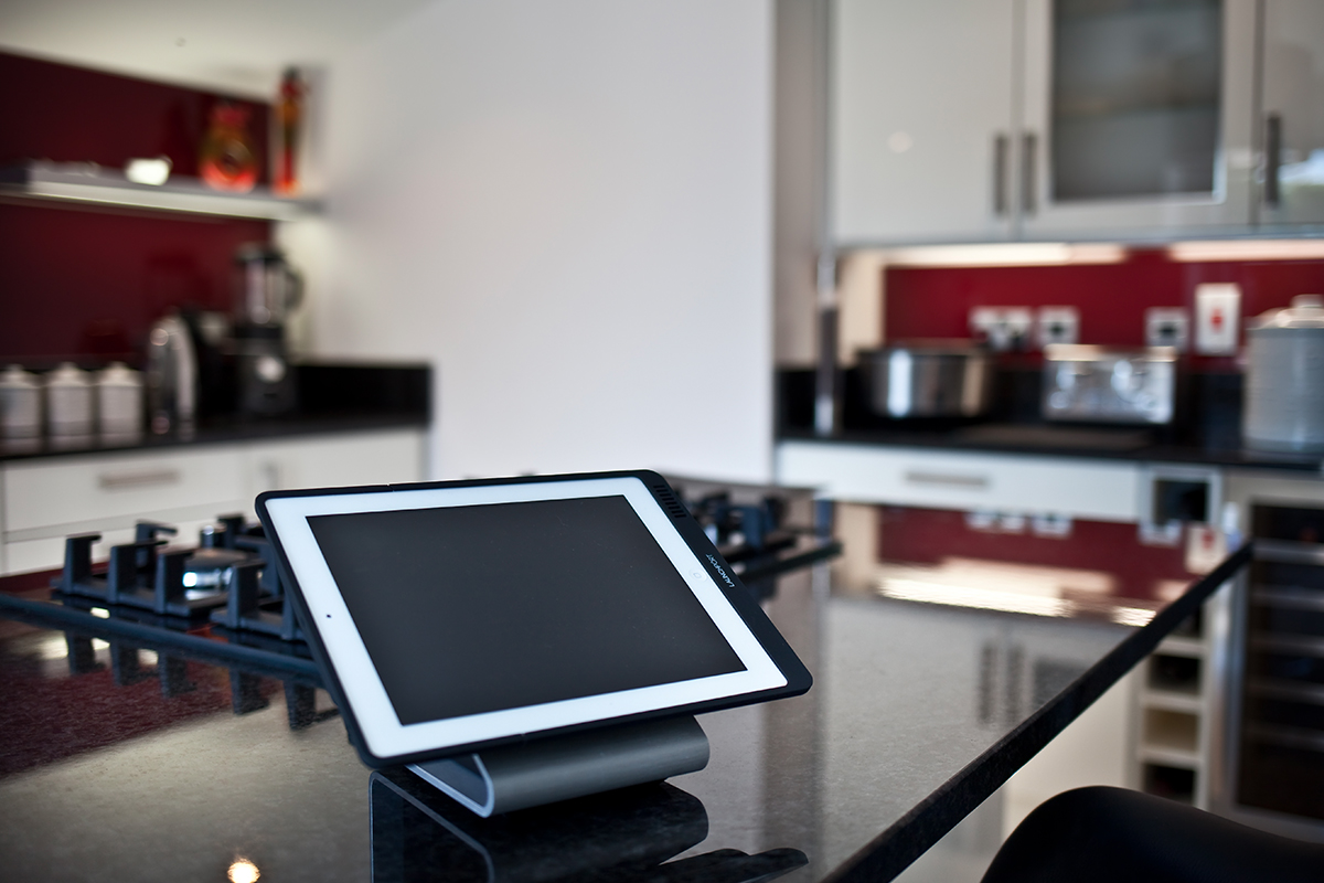 Tablet on a stand on a kitchen island