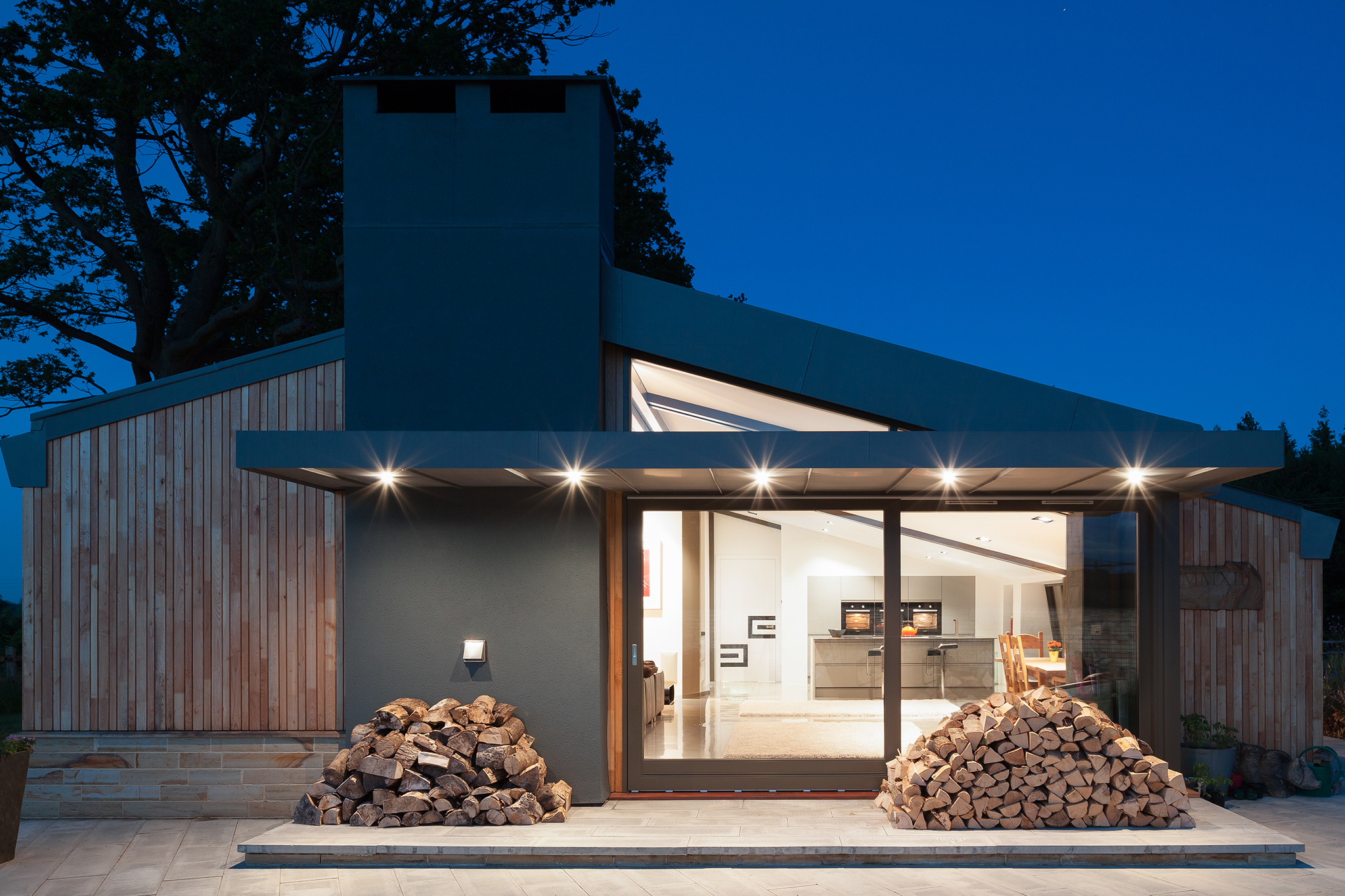 Outside of a modern smart home at night